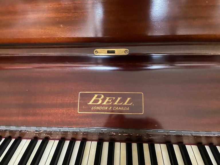 UPRIGHT OVERSTRUNG MAHOGANY PIANO WITH JOHN AUSTIN STOOL