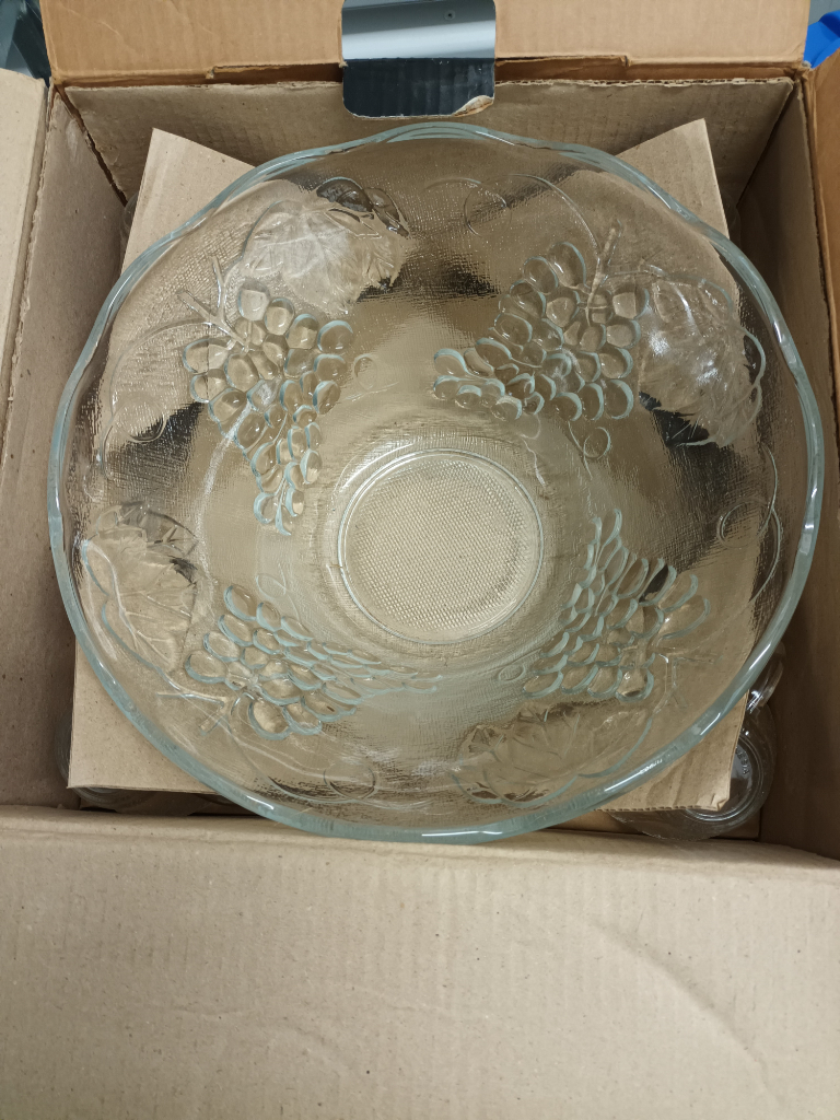Vintage Romance 12 Cup Glass Punch Bowl Set. The ad is up so this item is still available