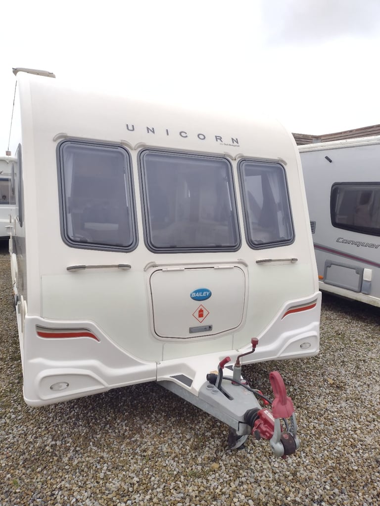 Bailey unicorn Valencia 2012 caravan fixed bed motor mover awning 