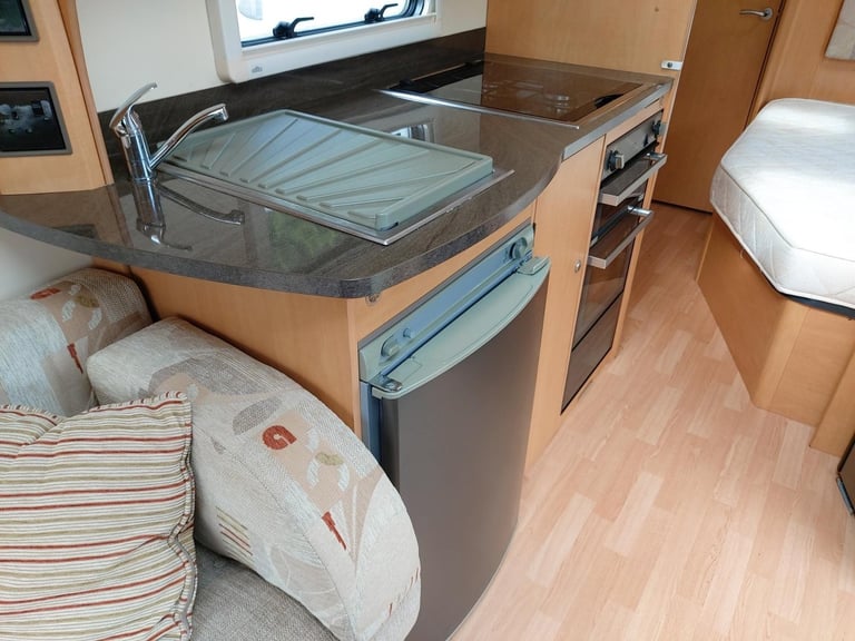 NOW SOLD 2010 Bailey Olympus 534 Fixed Bed End Washroom Caravan Motor Mover