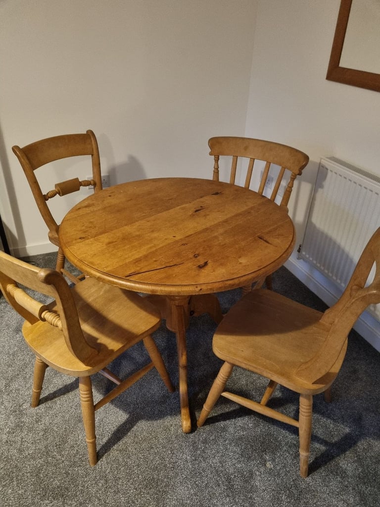 image for Solid wood, table and 4 chairs.