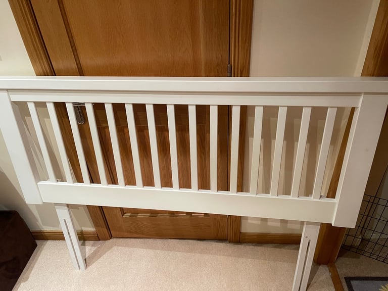 White wooden headboard