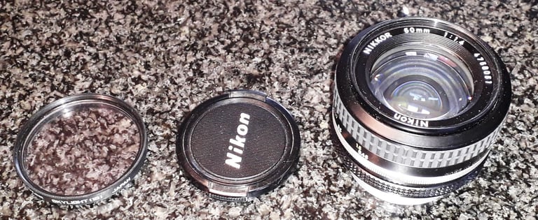 Nikon FE SLR Camera + accessories