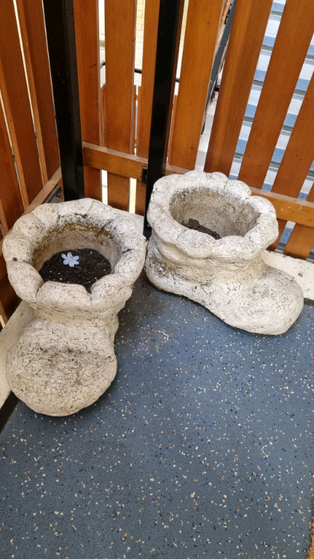 Two stone boot planters