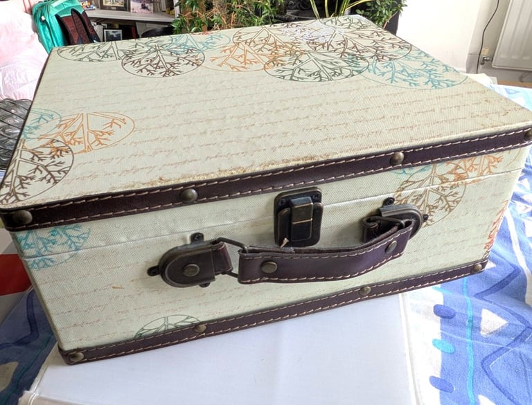 Patterned storage box with clasp and handle. £7 ONO