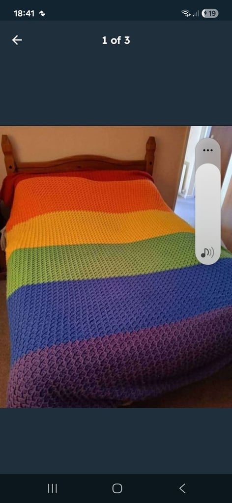 Crocheted king-size.  Rainbow colours Striped blanket