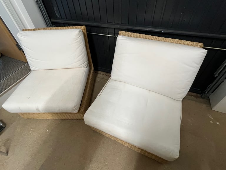 TWO rattan and bamboo chairs with cushions