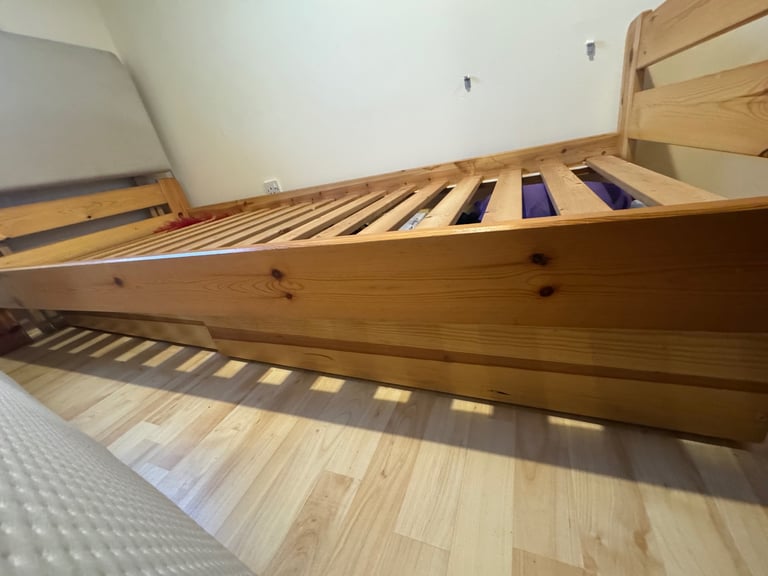 IKEA Pine Wood Single Bed with roll out drawers 