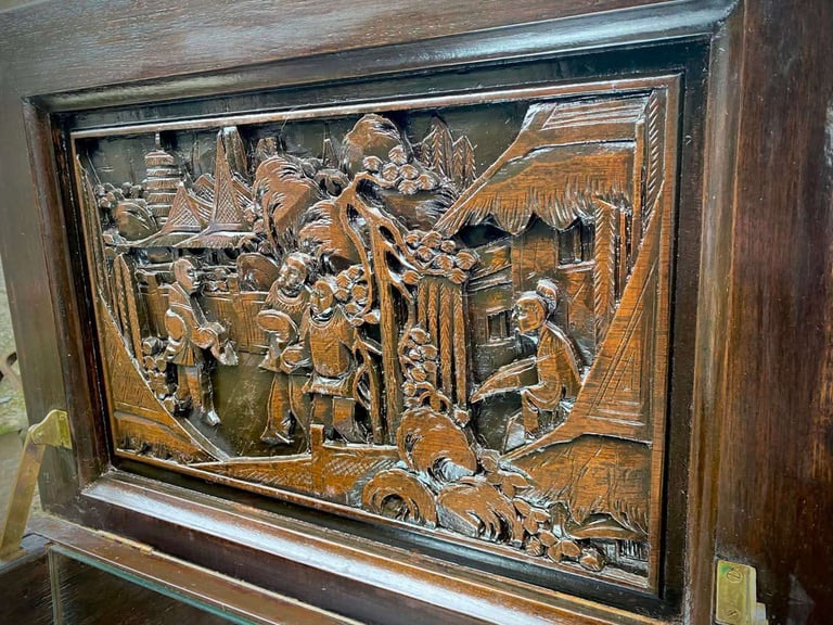 20th century Chinese heavily carved camphor wood cocktail bar cabinet
