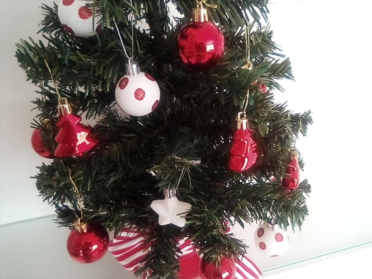 As new small Christmas tree with hanging baubles etc included.