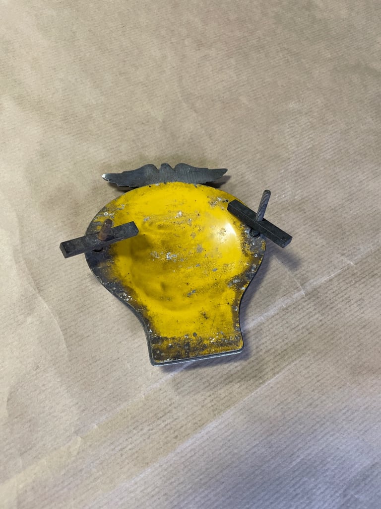 AA chrome car badge from 1945 + 1 other