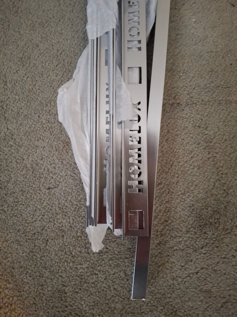Silver tile trims