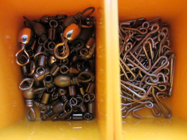 Large Assortment of sea fishing tackle in organiser box