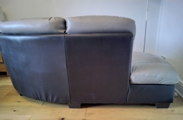 Black and grey leather corner unit.
