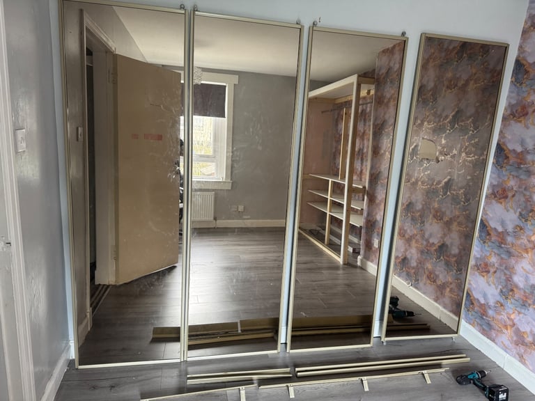 image for 4x Rose gold tinted sliding mirror wardrobes 