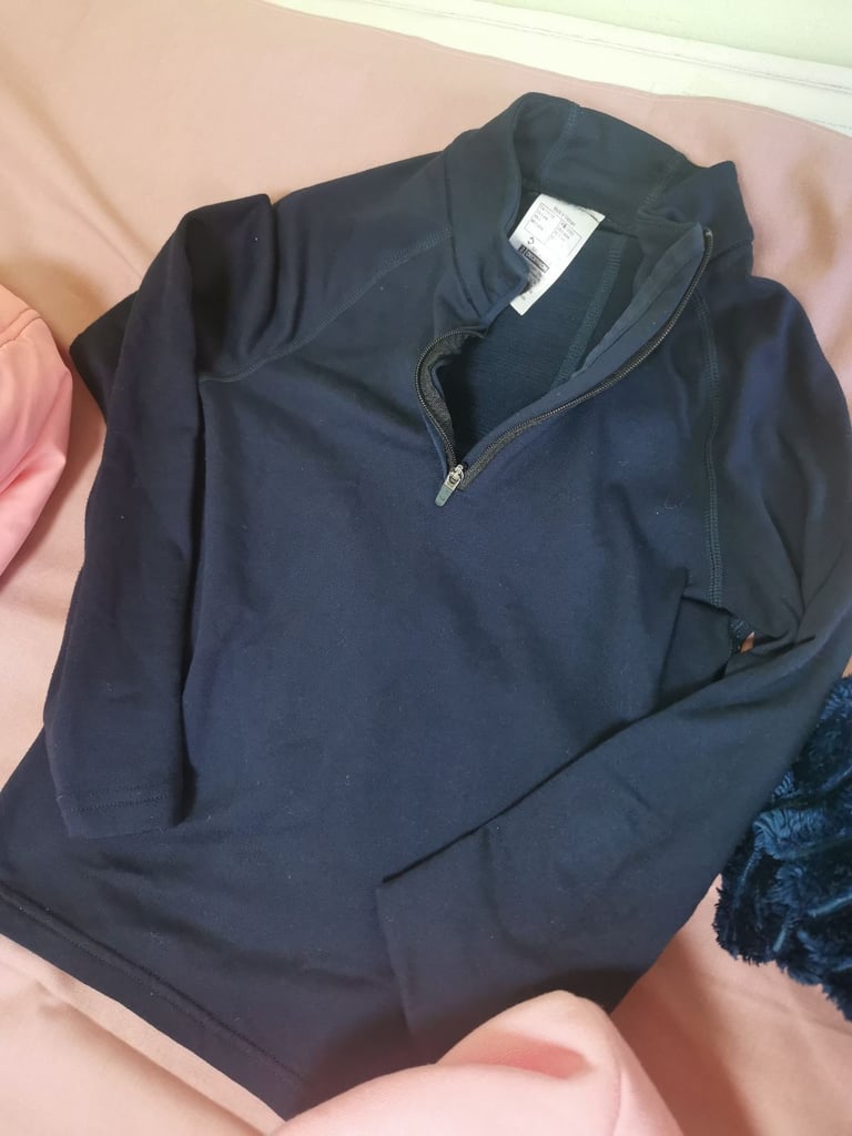 A set of clothes for a 5-6 year old girl. Most of the clothes are in good condition. 