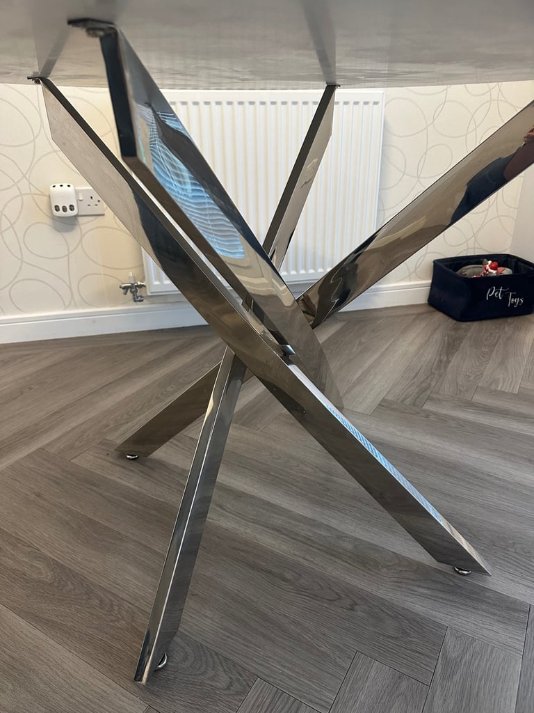 Grey marble effect glass top dining table with chrome legs and 4 grey suede dining chairs 