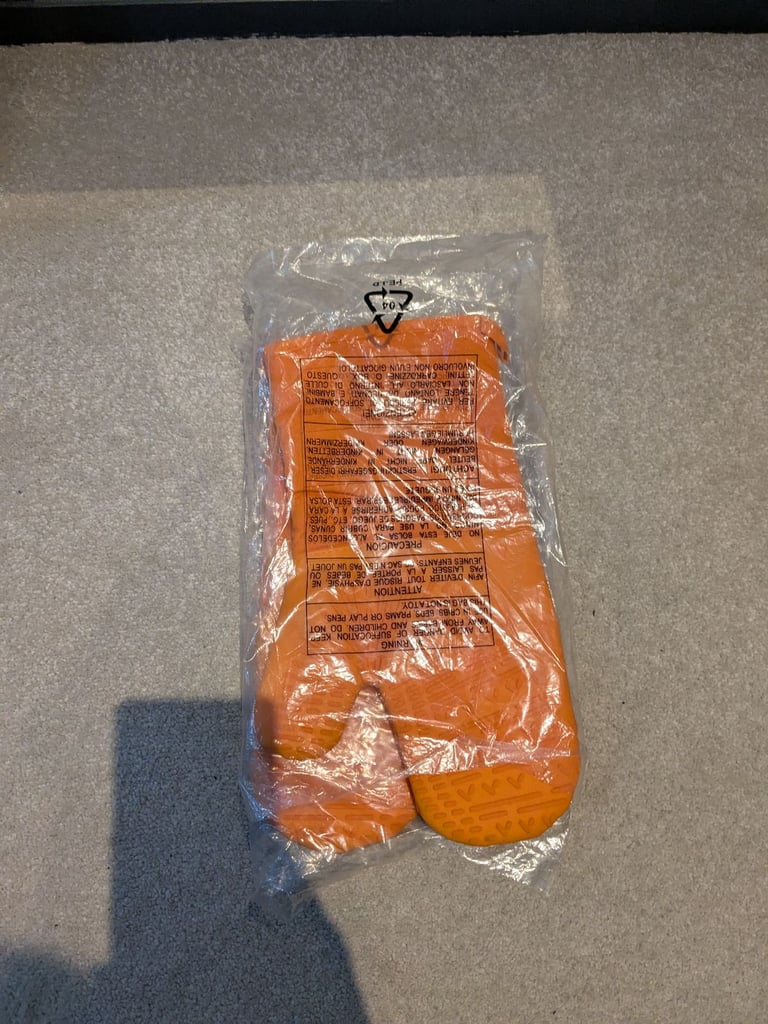image for Orange oven gloves worth £15