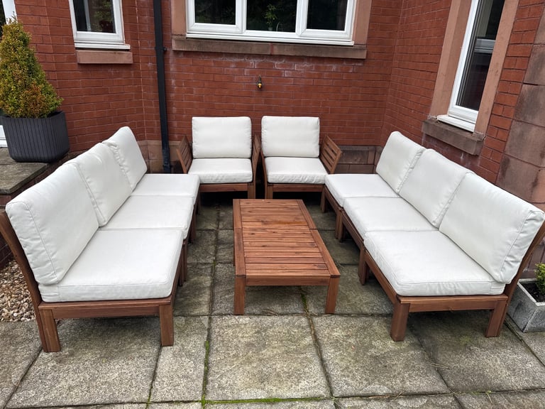Ikea wooden garden furniture with beige cushions