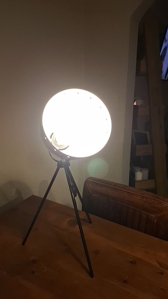 Black tripod lamp