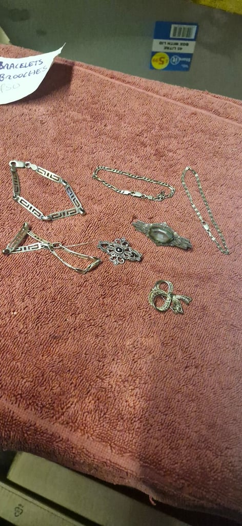 4 silver bracelets and 3 brooches