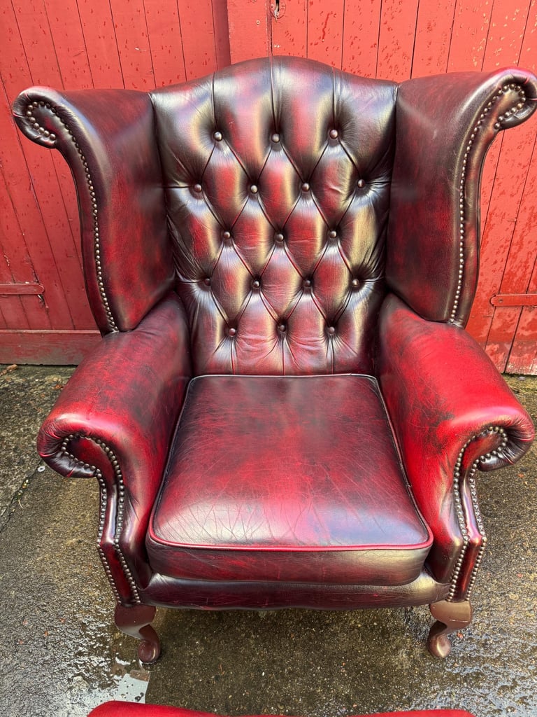 Chesterfield Leather wingback armchair and matching footstool
