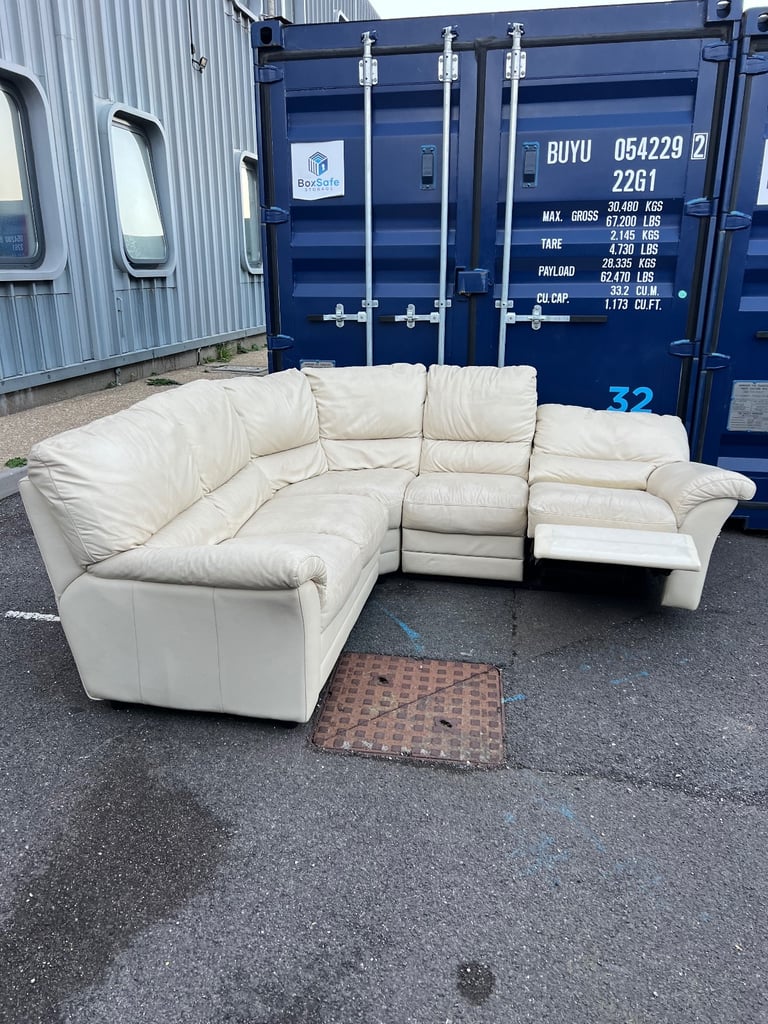 Cream leather corner sofa with recliner 