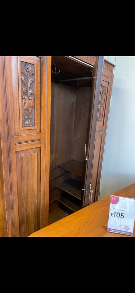 Beautiful dark wood wardrobe with carved flower inlay 
