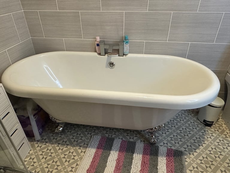 Free Standing Roll top bath with mixer tap. In excellent condition.