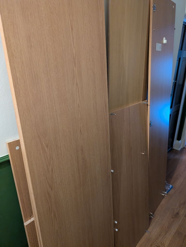 Brimnes 3-door ikea wardrobe - brown/oak.