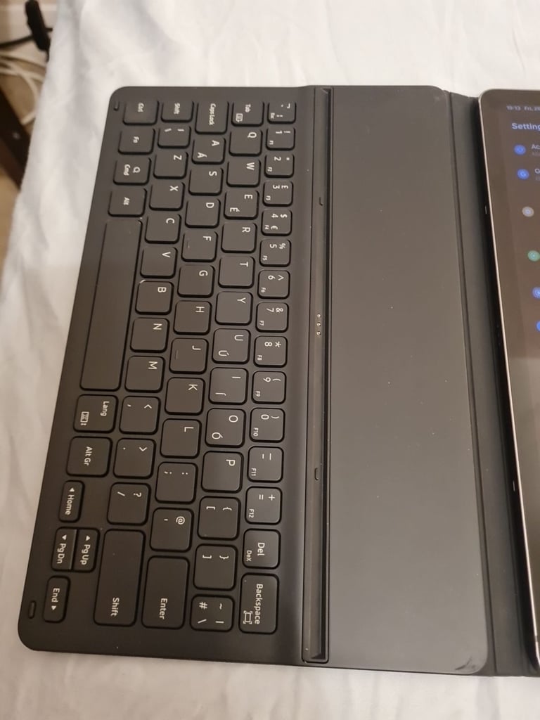 Samsung Galaxy Tab S9 FE, plus keyboard cover, and S Pen