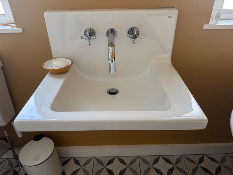 Roca wall mounted sink with back splash