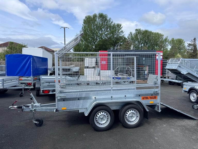 NEW 8,2ft X 4,3ft (BC752) TWIN AXLE TRAILER WITH 80CM MESH & RAMP 1300KG