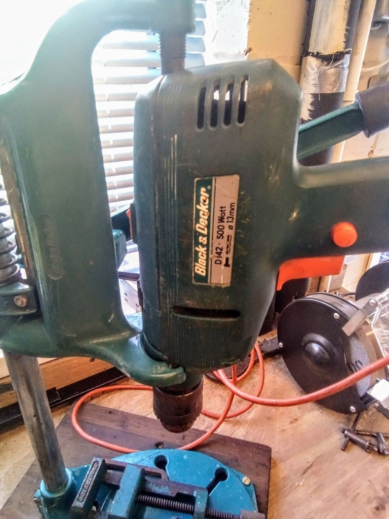 Drill with bench attachment and vice.