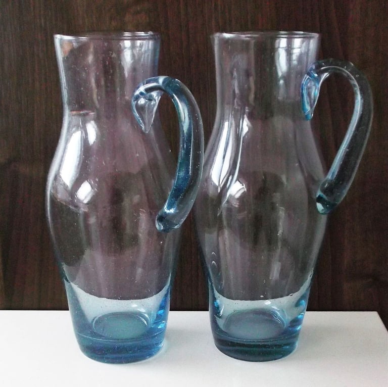 image for Pair of NEW Blue Tinged Tall Glass Juice/Water Jugs