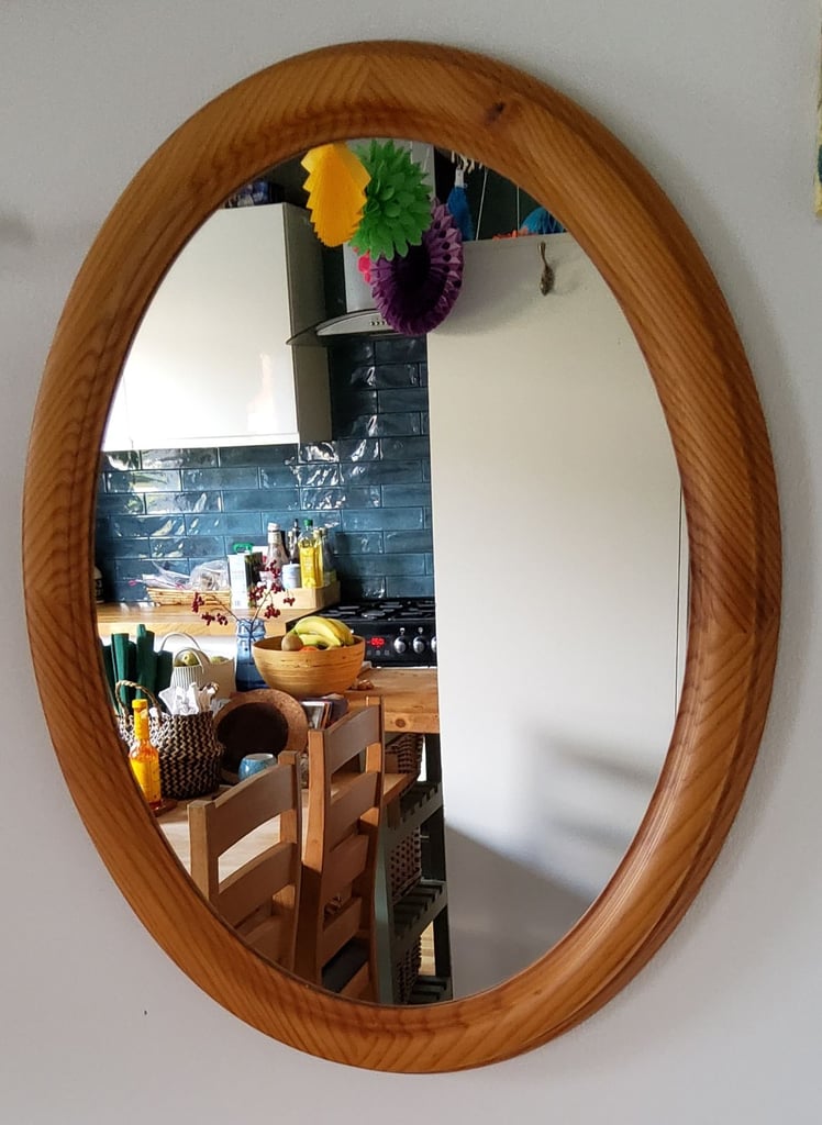 Oval mirror in a wooden frame,  very good condition 