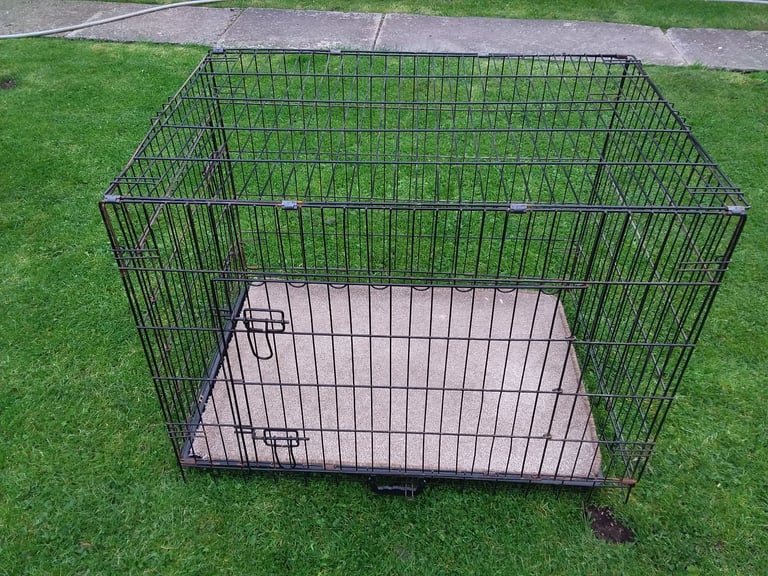 DOG CAGE.
