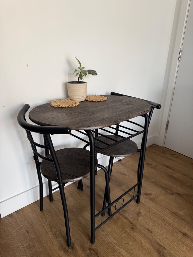 image for Dining table and chairs