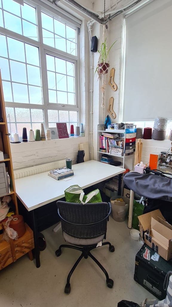 Deskspace in shared artist co-working space