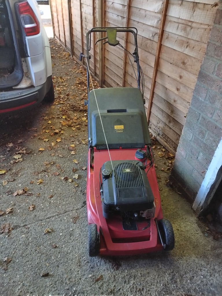 Petrol rotary lawnmower with grass box 4 stroke engine with height adjustment vgc gwo 