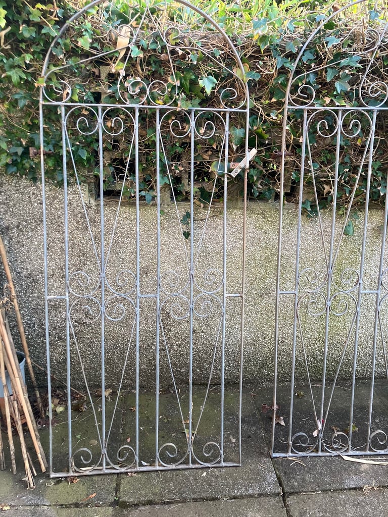 Set of 2 wrought iron scrolled gates , archway shaped unpainted 