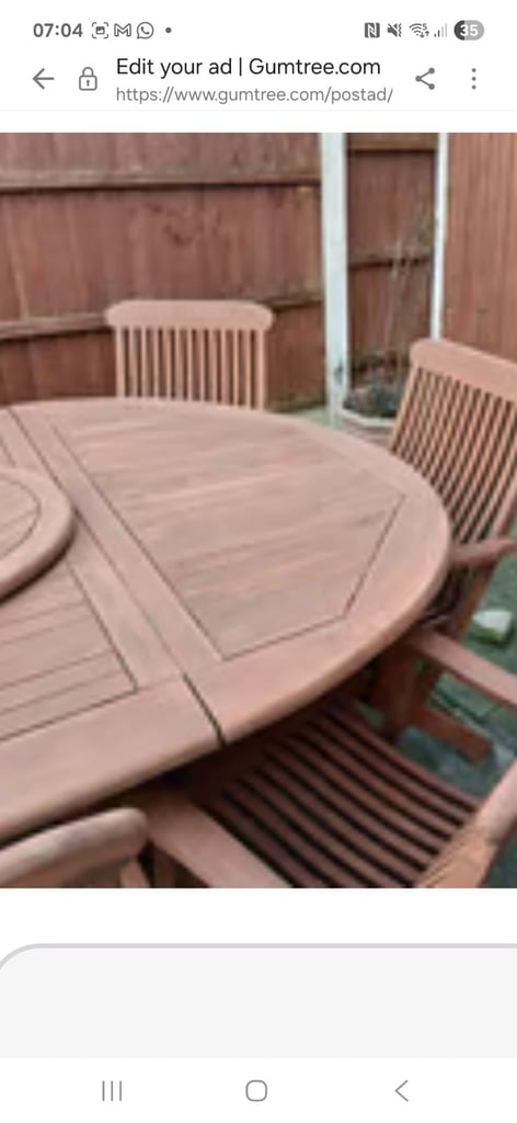 7 solid wood stained chairs and large table set. 