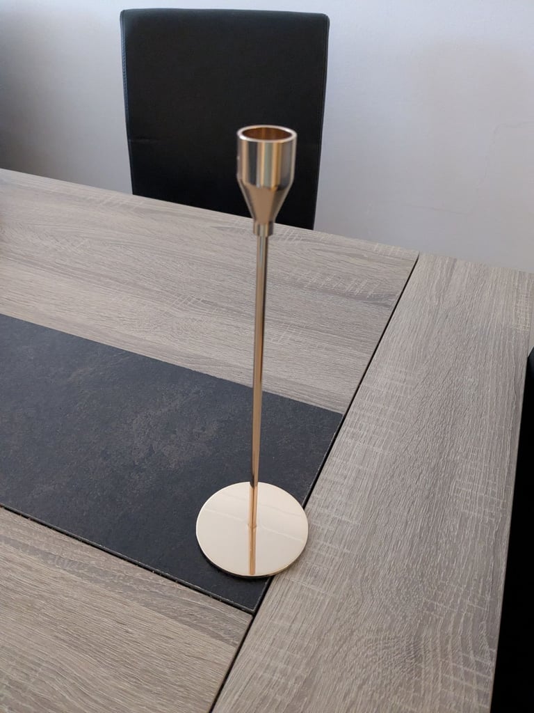 Gold-coloured candle holders