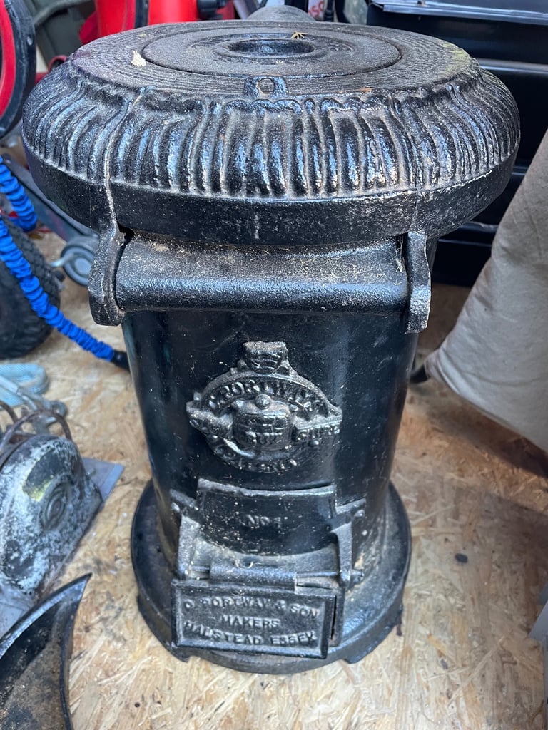 ANTIQUE TORTOISE WOOD BURNING STOVE 
