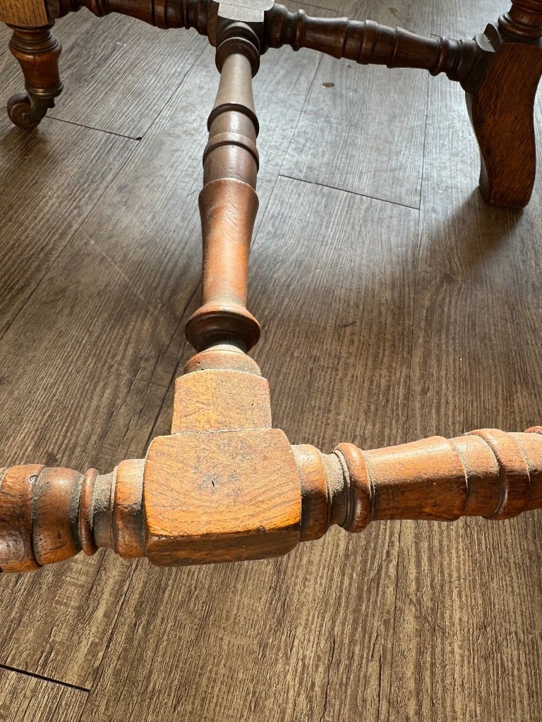Antique Oak Victorian chair bobbin turned legs with front castors. 