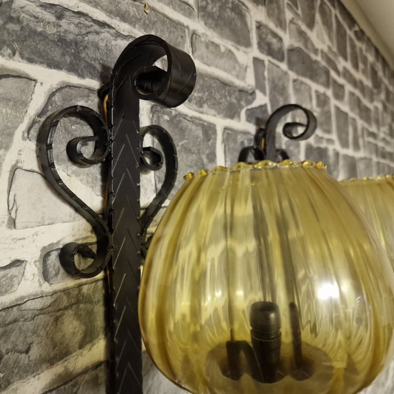 Pair of Vintage Wrought Iron Wall Sconces with Amber Glass Shades