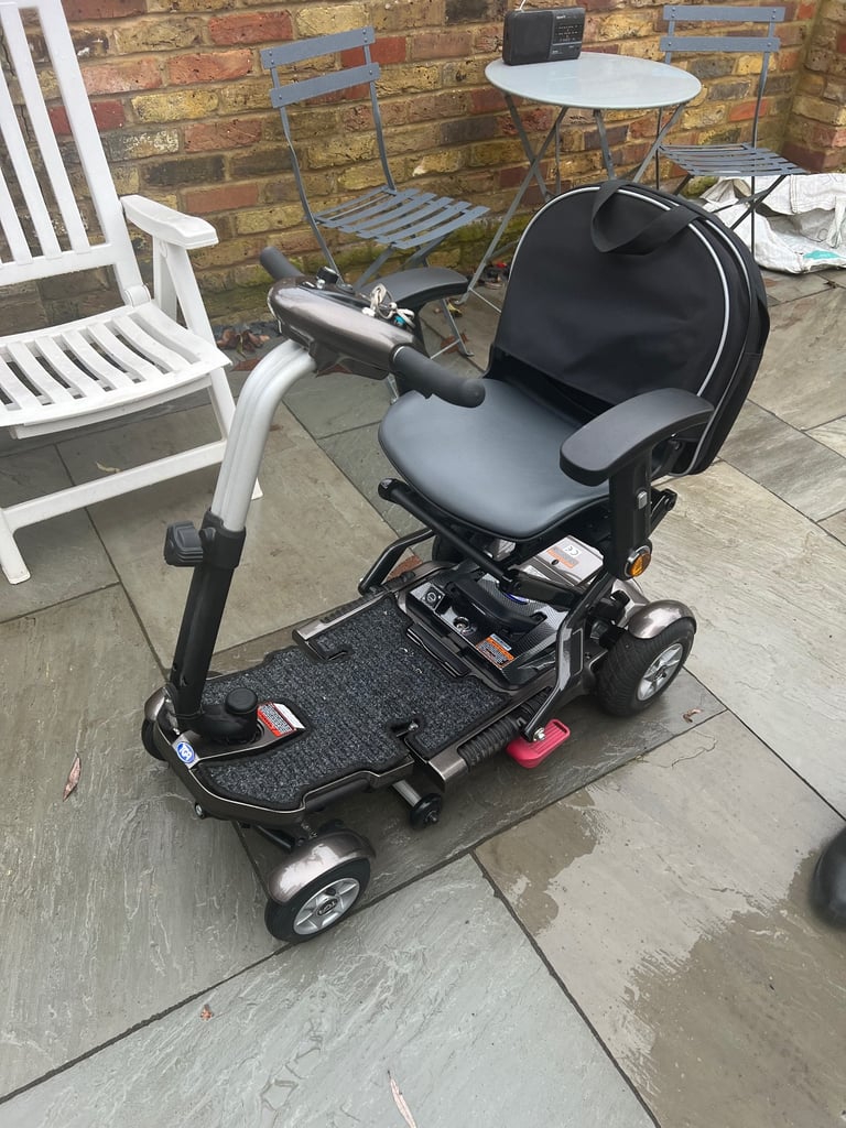 Mobility scooter minimo cost £3k like new 