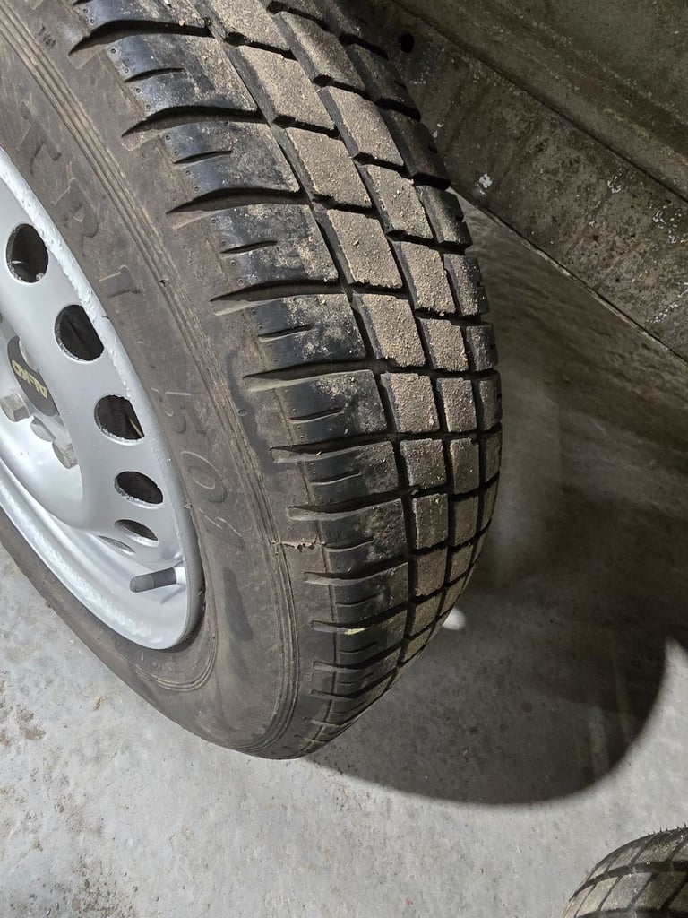 Unbraked 8.7ft by 4.2ft Trailer w/ ramp.