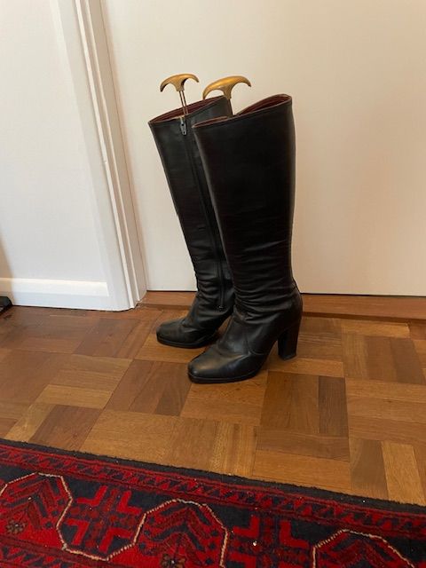 Knee length leather boots