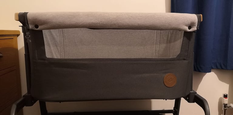 Maxi Cosi Iora next to me cot